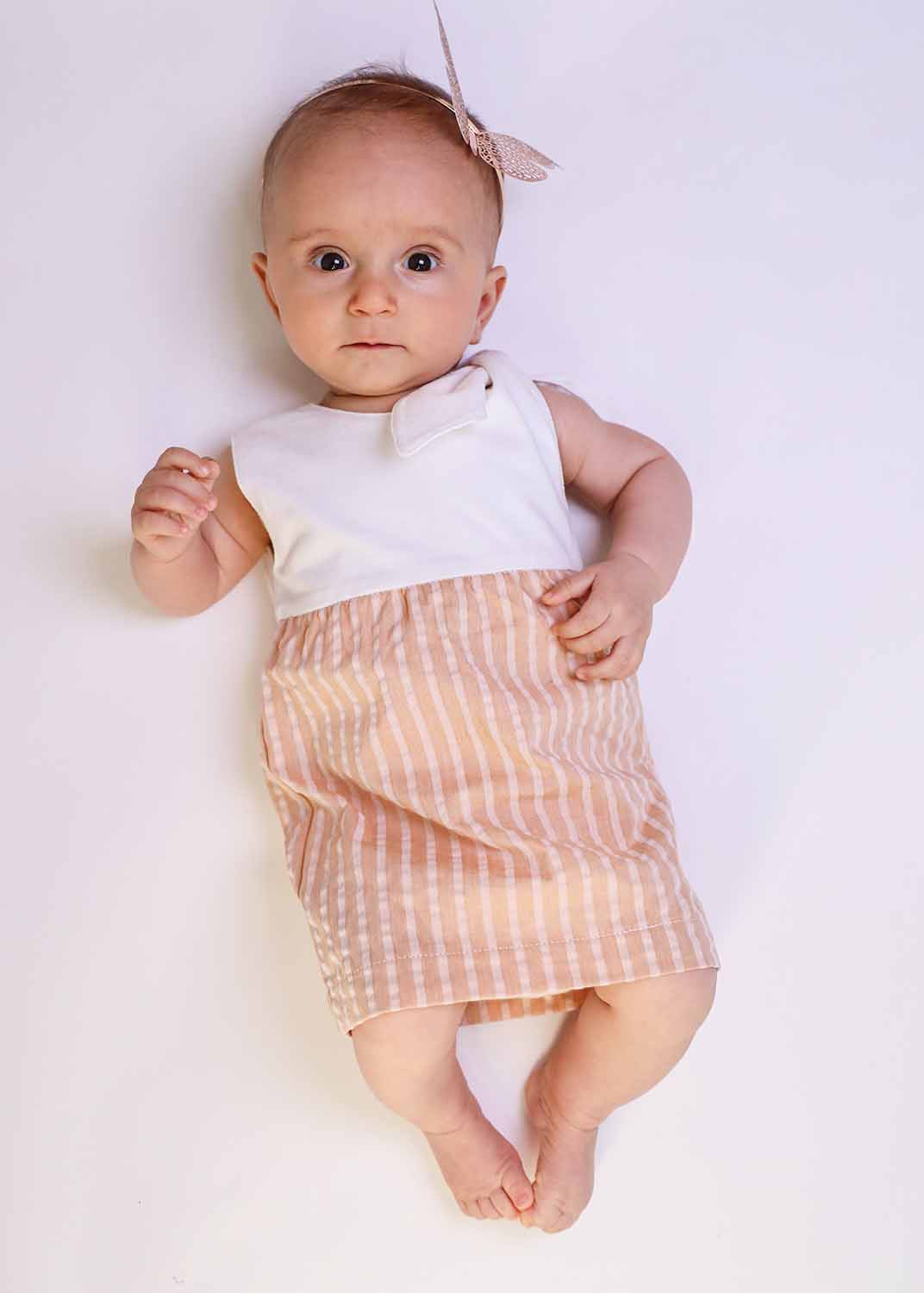Infantium Victoria Babykleid Pfirsich Weiß Schleife 80